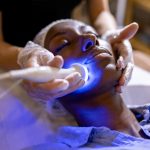 young-african-american-women-getting-a-rejuvenation-treatment-on-her-face